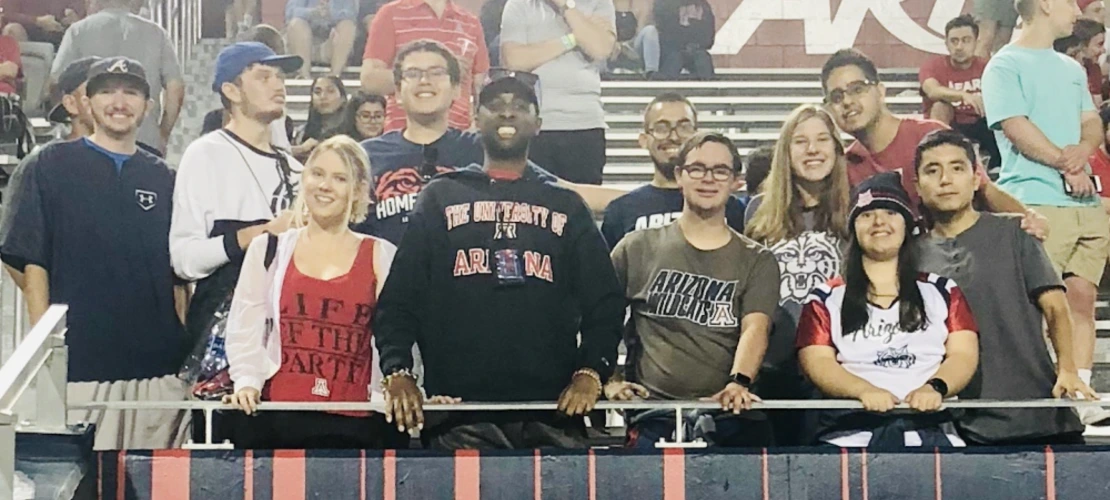 group of students in the ZonaZoo during home football game