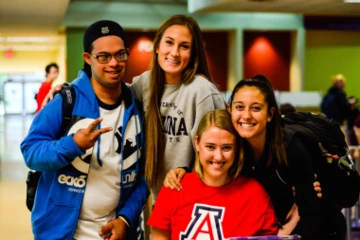 Project FOCUS peer mentors with two students photo